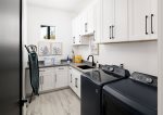 Laundry Room with washer, dryer, and sink 